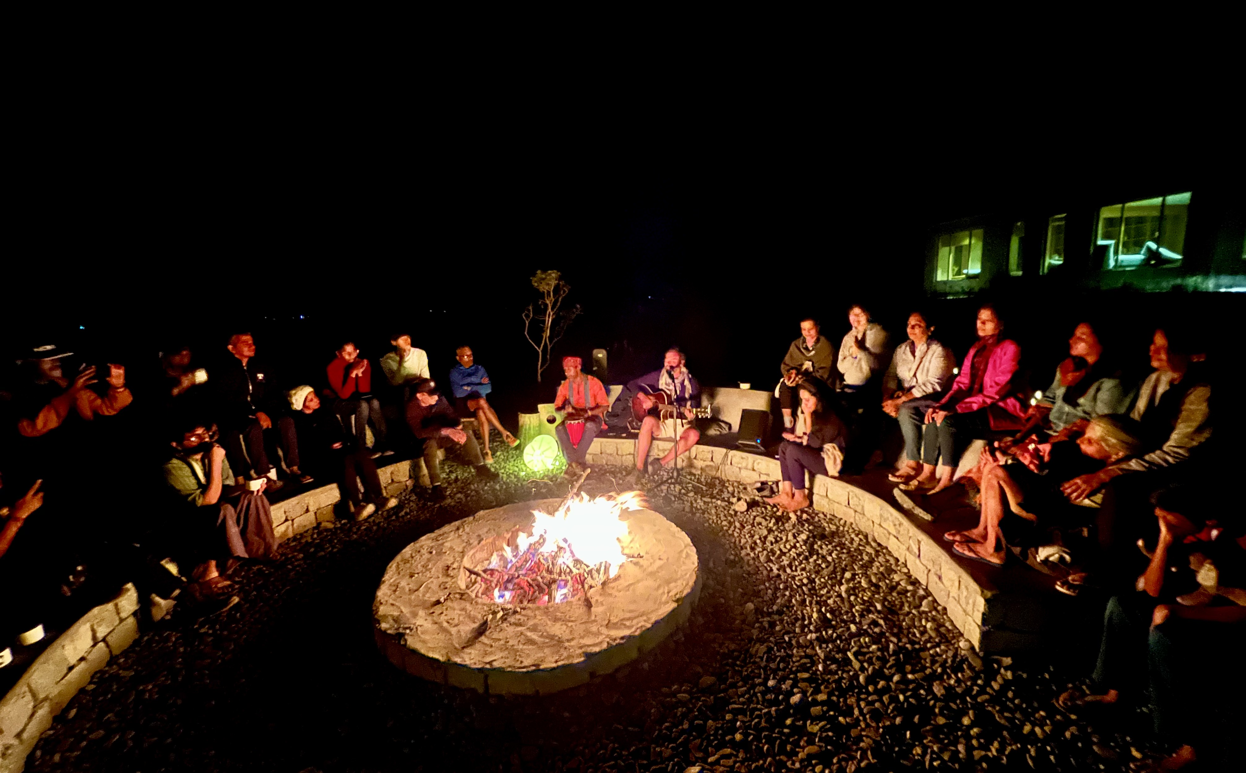 Retreat gathering around the fire